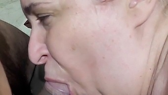 Middle-Aged Woman Gives A Young Man A Blowjob