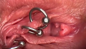 Close-Up Video Of A Pierced Clit And Wet Pussy With Peeing